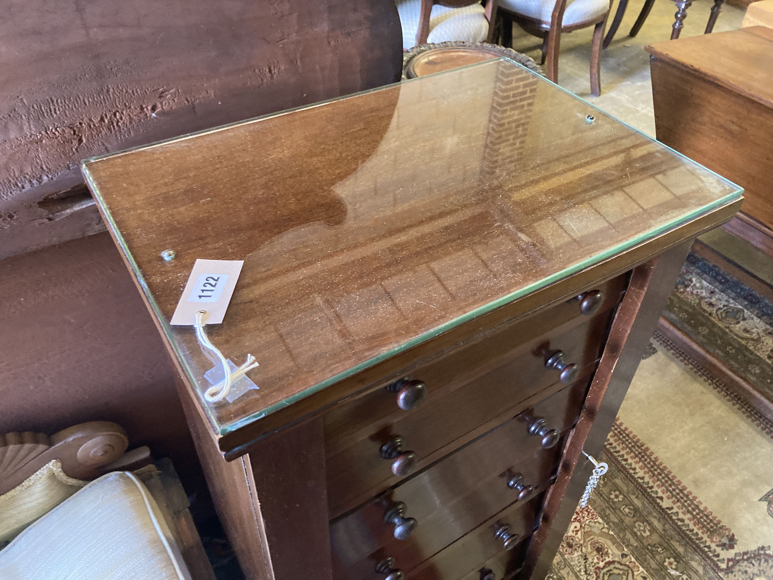 A Victorian mahogany Wellington chest, width 50cm, depth 35cm, height 104cm